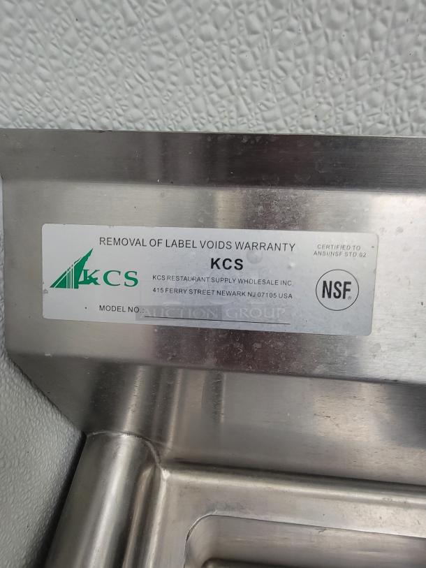 Stainless steel commercial kitchen dish station label, featuring KCS brand, warranty notice, and NSF certification details.