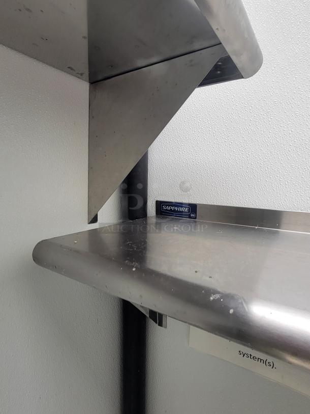 Stainless steel commercial kitchen shelf from Sapphire, part of a high-efficiency dish station bundle. Robust and professional-grade.