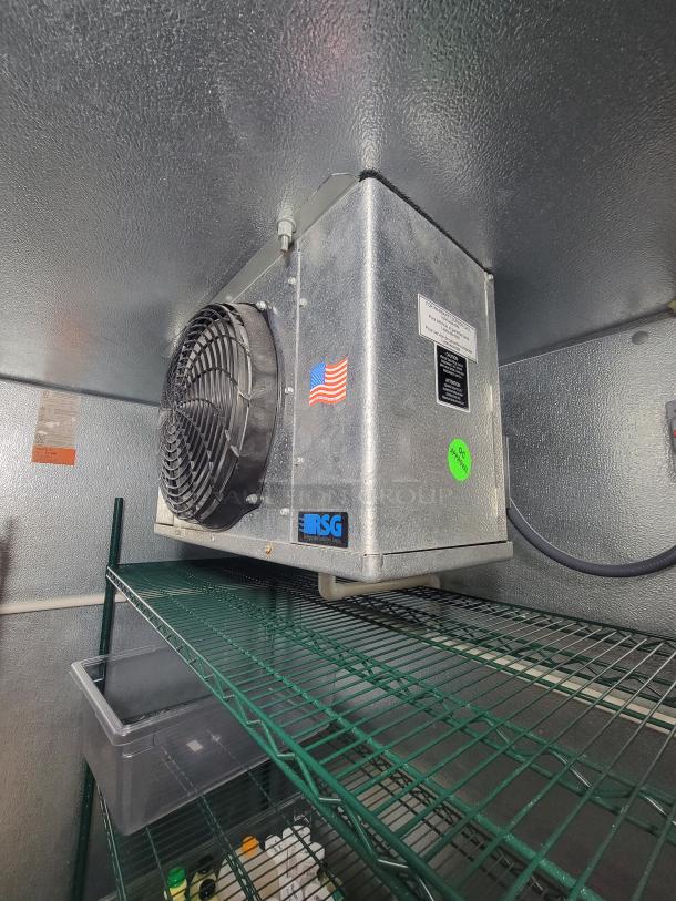 Norlake walk-in cooler unit with RSG branding, American flag sticker, green Metro shelving, excellent condition.