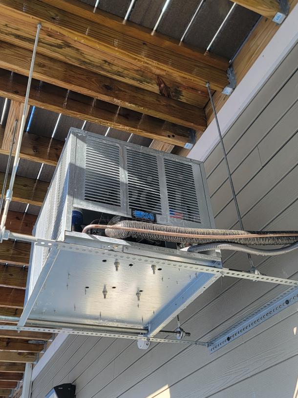 RSG wall-mounted condensing unit for Norlake walk-in cooler and freezer, excellent condition, USA-made, attached to ceiling.