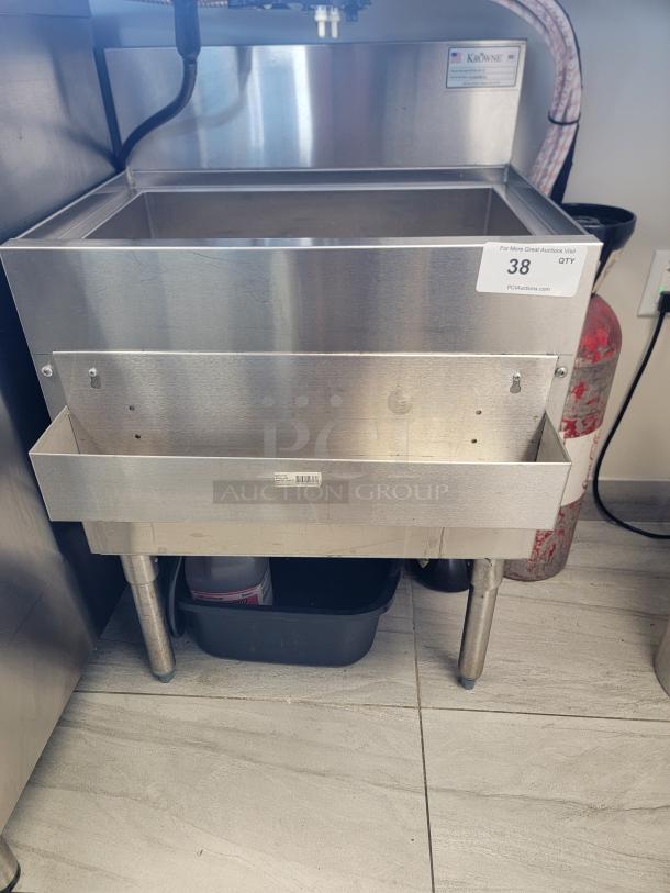 Krowne KR18-24-10 stainless steel ice bin with insulated well, front speed rail, and NSF certification.