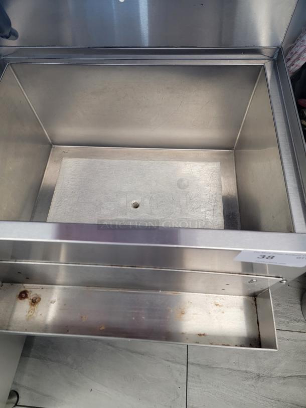 Krowne KR18-24-10 stainless steel ice bin with deep insulated well and front speed rail, NSF certified, good condition.