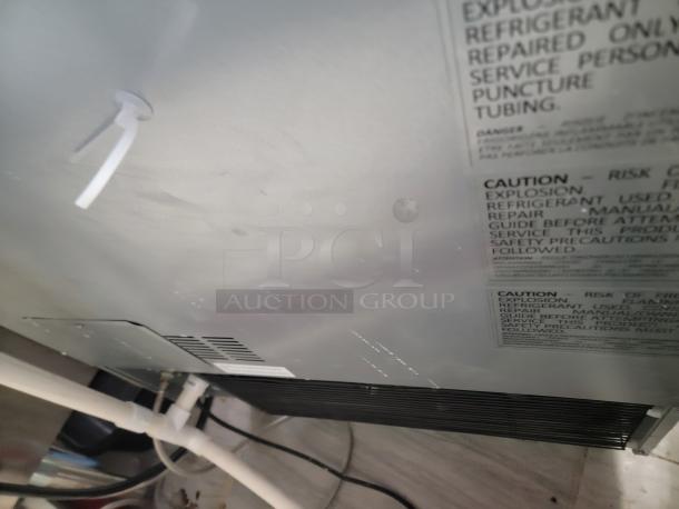 ITV Spika NG360-A1H under-counter ice maker, like new, featuring stainless steel build, energy-efficient R290 refrigerant, and caution labels.