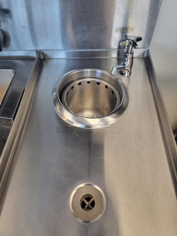 Krowne KR24-MS24 underbar station with integrated glass rinser, perforated dump sink, and swivel faucet, stainless steel.