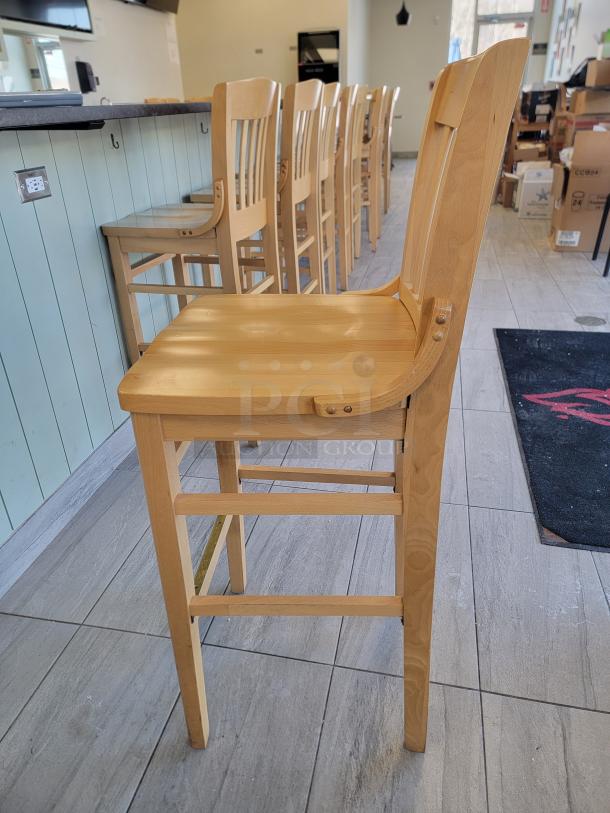 Richardson Seating wooden bar stool, classic slat-back, natural finish, pristine condition. Lot of 24 for commercial use.