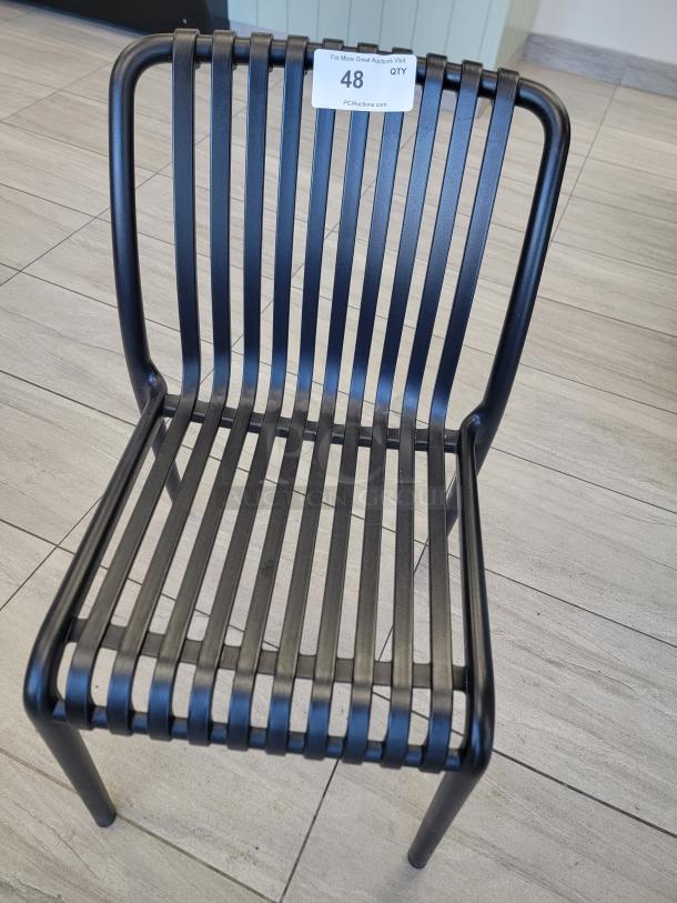Modern slatted dining chair, composite, matte black finish, durable design, ideal for dining areas or cafes. Lot of 18.