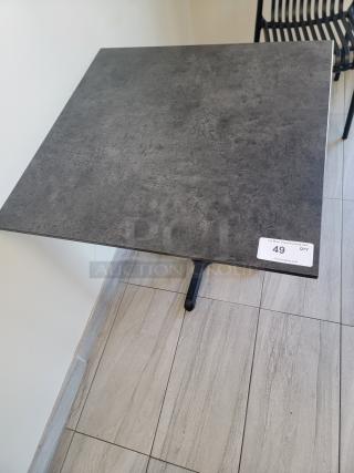 Square Hospitality Bistro Table by Flash Furniture, slate-gray finish, cast-iron base, tag indicates item number 49, modern design.