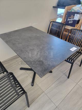 Flash Furniture commercial dining table, concrete-style laminate, black cast-iron X-base, durable condition.