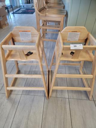 Winco CHH-101 stacking high chairs, natural wood, set of 2, with safety straps, visible warning labels, perfect condition.