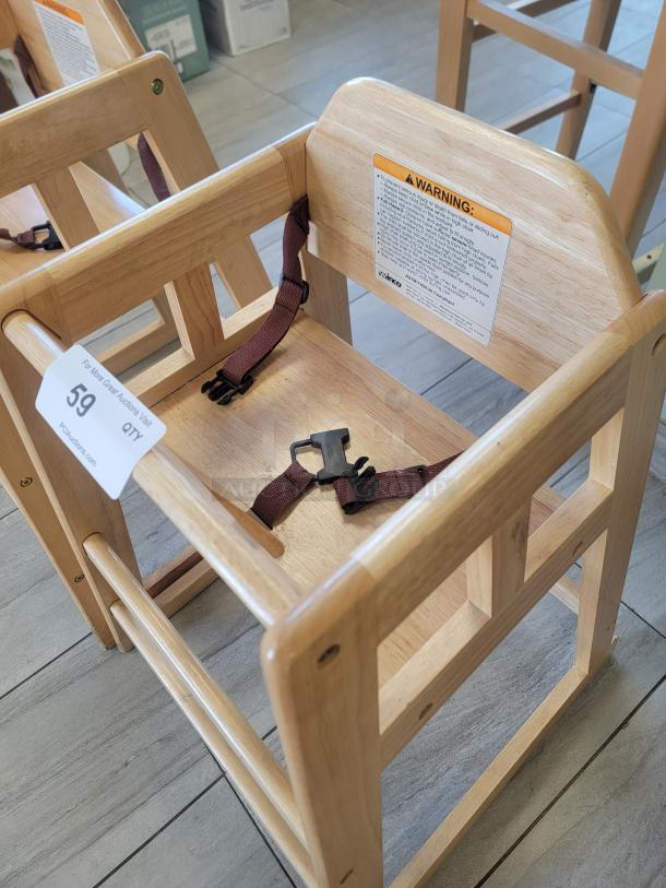 Winco CHH-101 stacking high chair, natural wood, safety straps, warning label visible, ideal for home or restaurant.
