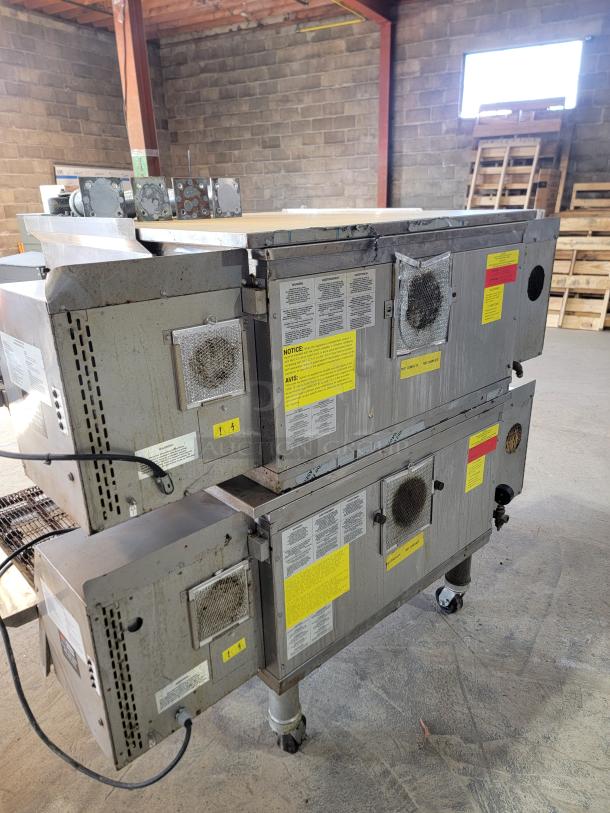 Middleby Marshall PS638G Double Stack Gas Conveyor Oven, WOW! Series. Durable, high-volume cooking. Labels indicate safety and operational info.