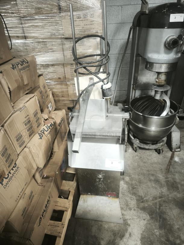 Palazzolo GS-1 Cheese Shredder on rolling stand, in used condition, metal construction, auction tag visible.