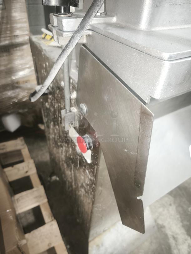 Palazzolo GS-1 cheese shredder with rolling stand, metal construction, visible red button, used condition.