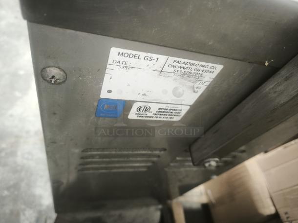 Palazzolo GS-1 cheese shredder with rolling stand, metal finish, model label visible, NSF and ETL certified.