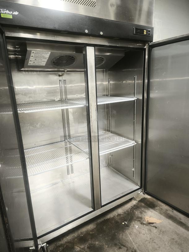 Turbo Air M3F47-2-N two-section reach-in freezer, two solid doors, stainless steel, 115v, clean interior, good condition.