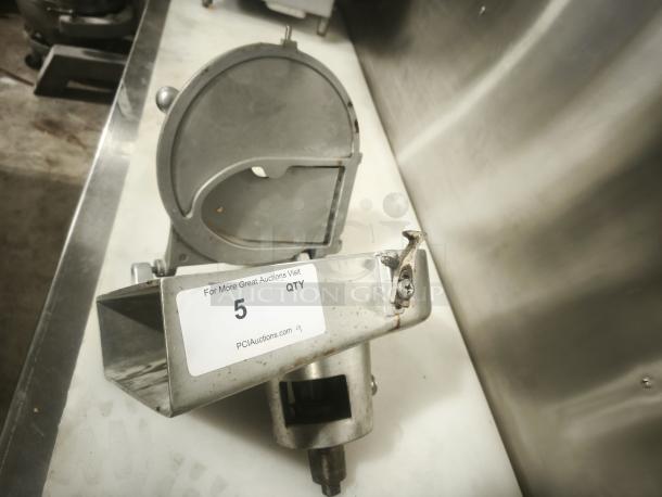 Hobart Pelican Head cheese shredder mixer attachment, used condition. Features a shredding blade and mounting hardware.