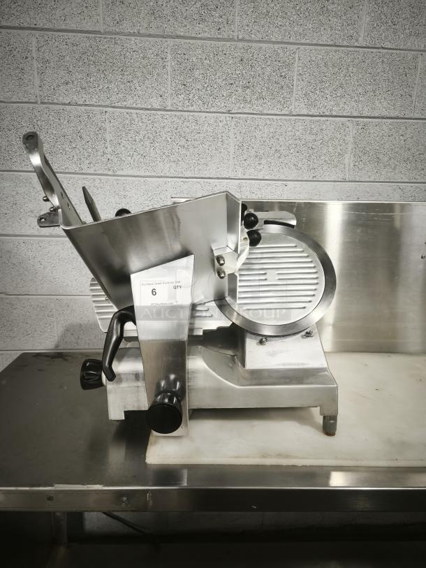 Patriot meat slicer with 10″ blade, stainless steel, industrial model, in good condition, with labeled settings visible.