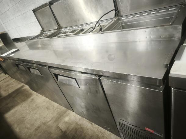 True TPP-93 93" 3-Door Refrigerated Pizza Prep Table, stainless steel, excellent condition, spacious prep area.