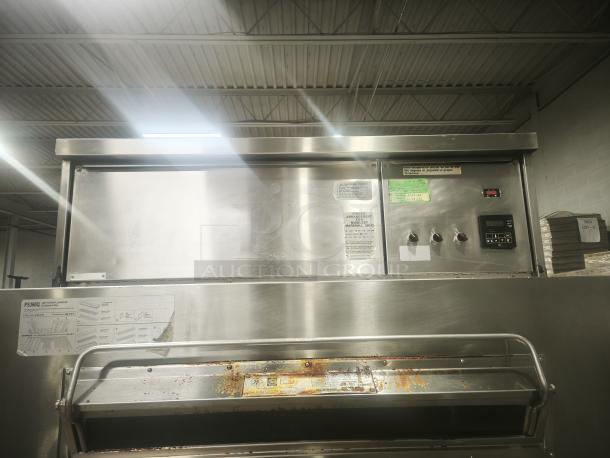 Middleby Marshall PS360 doublestack gas pizza oven conveyor in industrial setting, with control panel and visible labels.