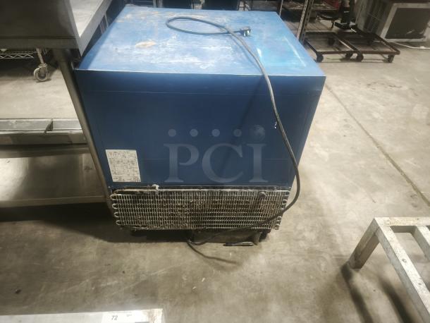 Minus Forty countertop freezer, model 07-csgf-x1-frc2, blue, visible wear, electric cord, label with specifications.