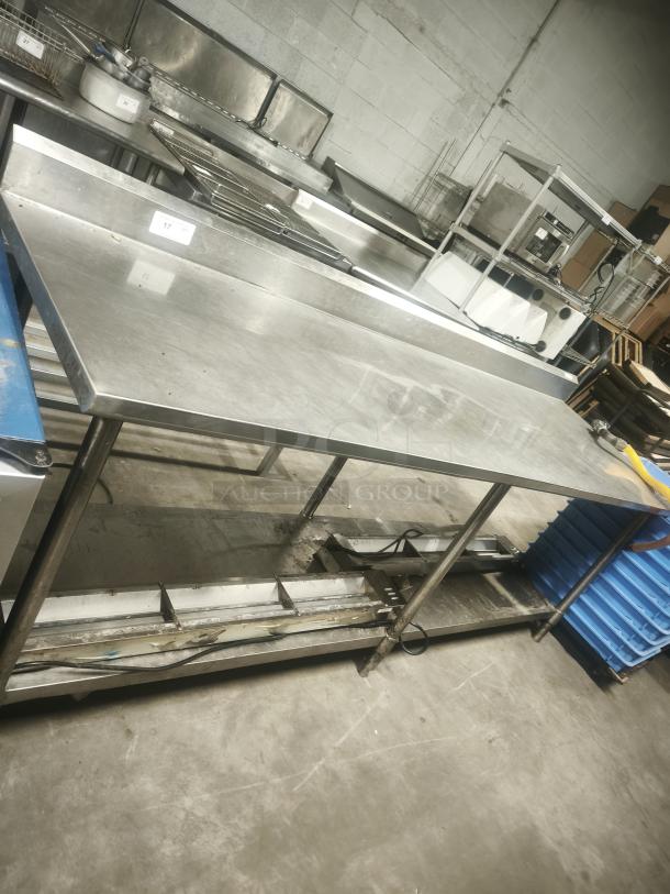 Economy stainless steel prep table, 95x31x36 inches, showcasing spacious surface, sturdy legs, and durable design. Ideal for commercial kitchens.