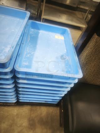 Blue stackable fiberglass utility totes, plastic trays, gently used, with visible label marked "18."