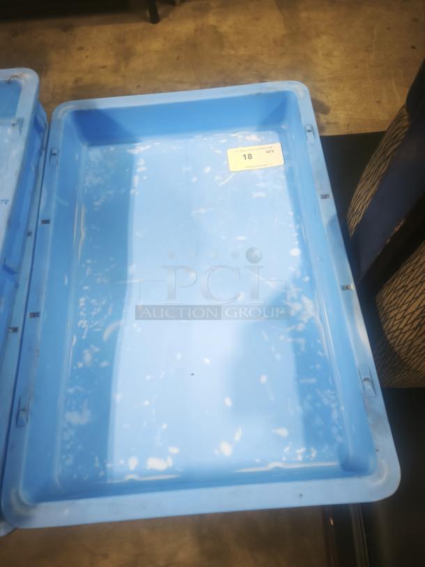 Blue stackable fiberglass utility tote tray, visible label "18 QTY," lightly worn, durable plastic construction.