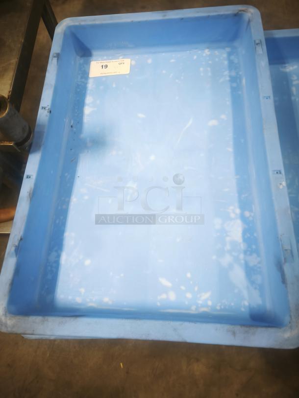 Blue fiberglass stackable utility tote, plastic, good condition, numbered 19, with auction label.