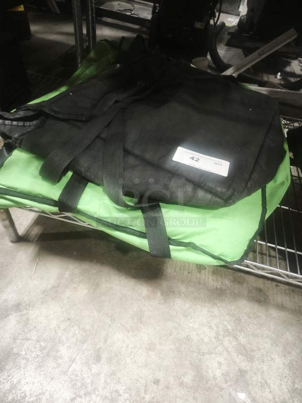 Commercial Products ProServe insulated delivery bag in black and green, good condition, tag indicates quantity 42.