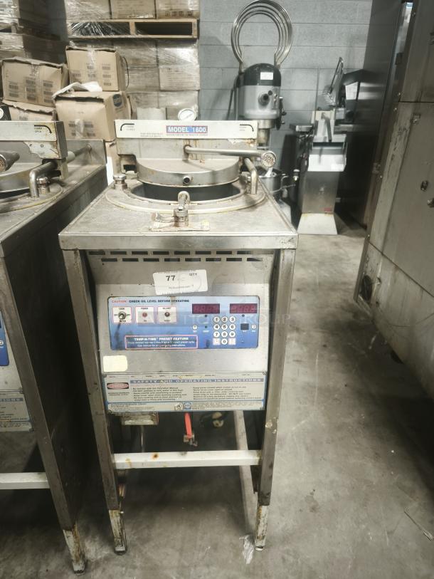BroasterFryer Model 1600 pressure fryer in used condition, featuring a digital control panel and safety instructions label.