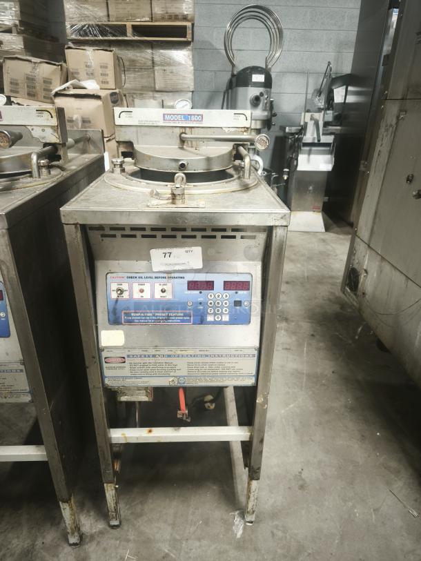 BroasterFryer 1600 Pressure Fryer, industrial-grade, used condition with visible wear. Features control panel and safety instructions.