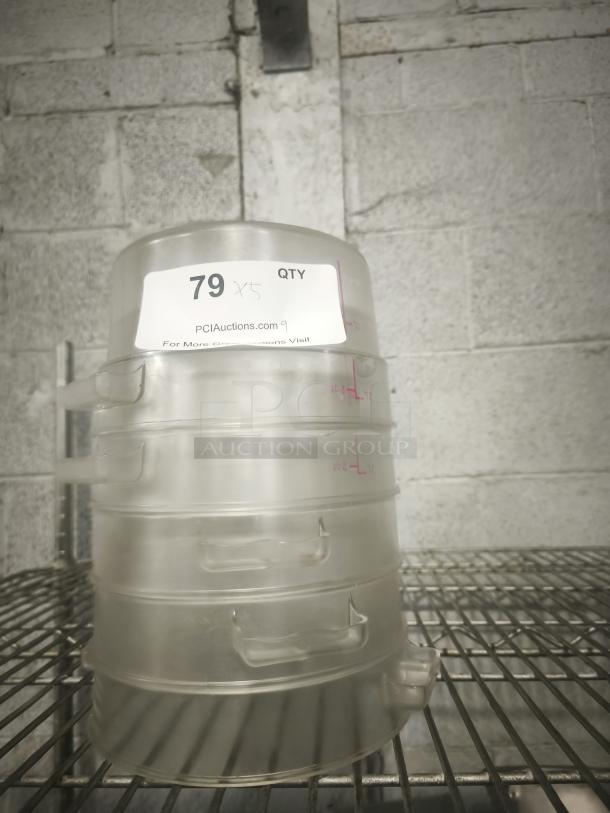 Clear 2 Qt. round food storage containers stacked. Features measurement markings and durable design. Quantity: 5.