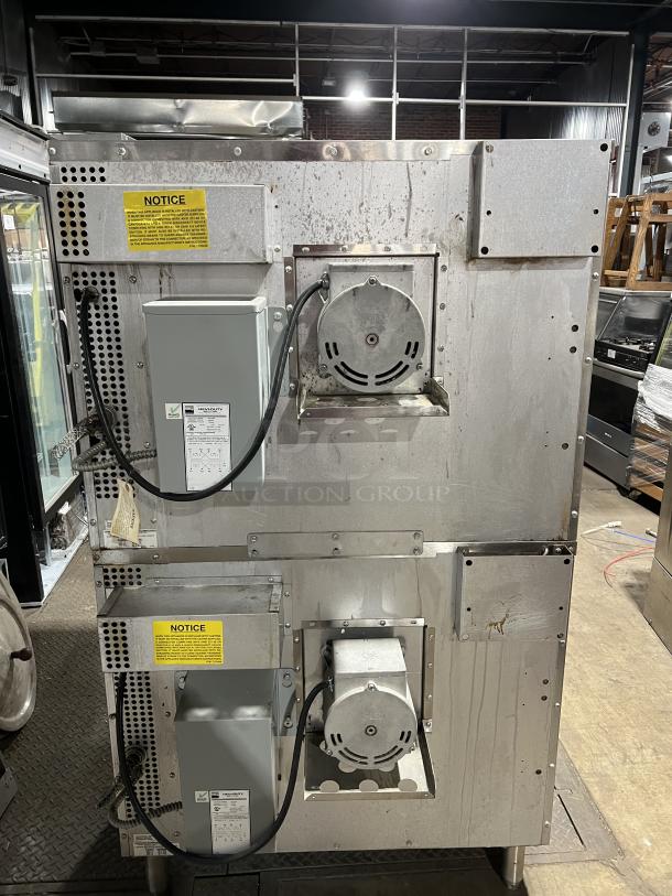 Southbend SilverStar SL-Series double stacked convection oven, SLES20SC model. Stainless steel, thermostatic controls, wired racks, on legs.