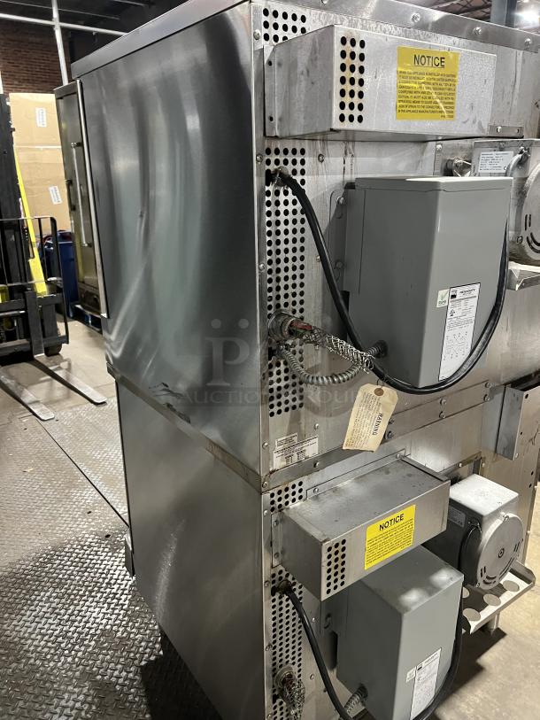 Southbend SilverStar SLES20SC commercial double convection oven, stainless steel, thermostatic controls, wired racks, on legs.