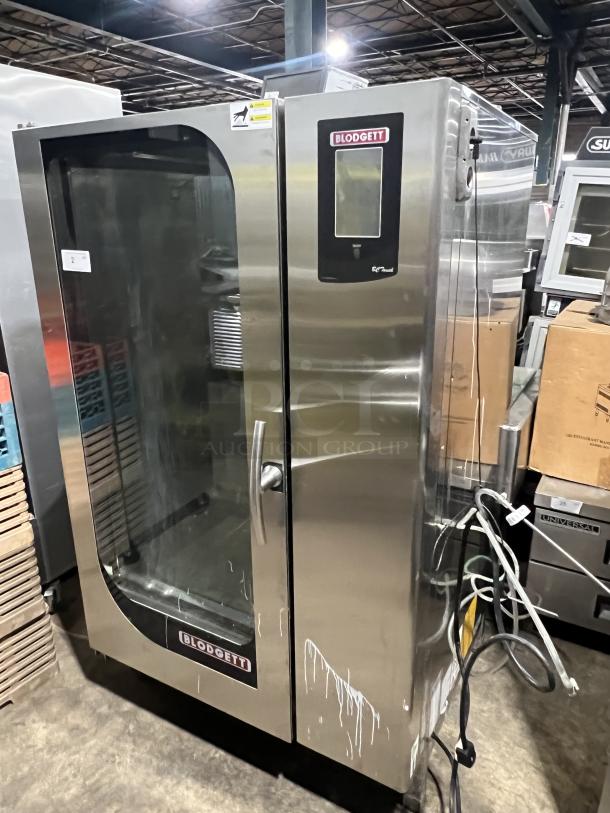 Blodgett BLCT202 stainless steel natural gas combi oven, model BLCT202, on legs, with visible branding and power cords.