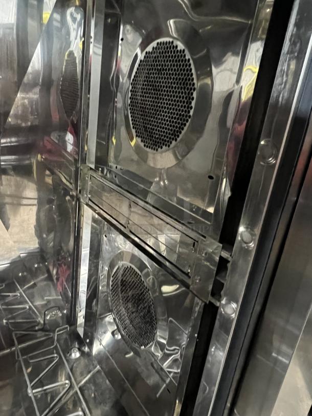 Blodgett BLCT202 combi oven, stainless steel, natural gas, 120V, 1 phase, interior fans visible, on legs, well-maintained.