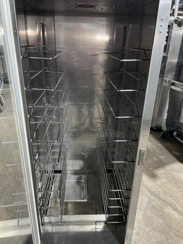 Vulcan VP18 stainless steel heated holding cabinet with universal pan slides, full-height, on casters, 120V 1 Phase.