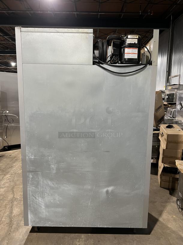 Beverage Air commercial stainless steel 2-door reach-in refrigerator, model HF2-1S, with poly-coated wired rack, side view.