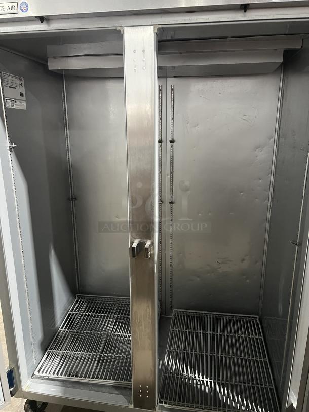 Beverage Air HF2-1S commercial stainless steel 2-door refrigerator, poly coated racks, serial number 11703201, excellent condition.