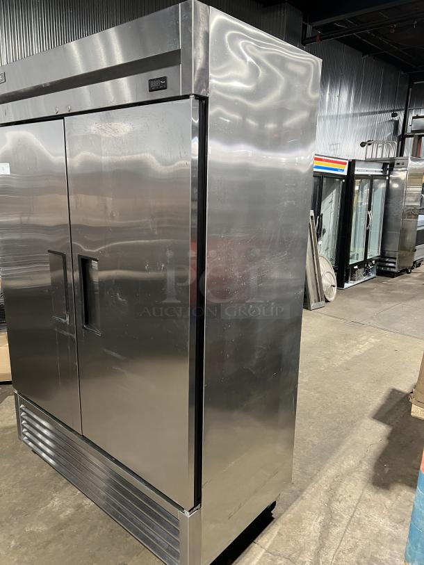 True T-49-HC commercial stainless steel 2-door reach-in refrigerator, poly coated racks, on casters, model T49HC, 115V, 1 phase.
