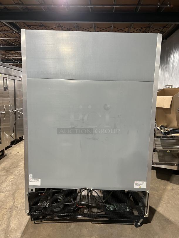 True T49HC commercial stainless steel 2-door reach-in refrigerator, with poly coated wired rack, on casters, model T-49-HC.