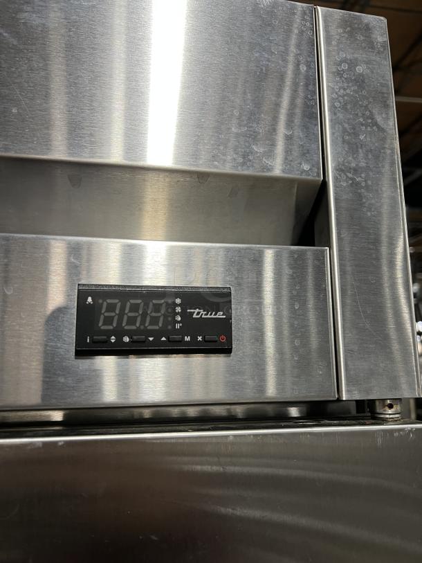 True T-49-HC commercial 2-door refrigerator, stainless steel, digital display, poly coated rack, Model SN: 9116892, on casters.