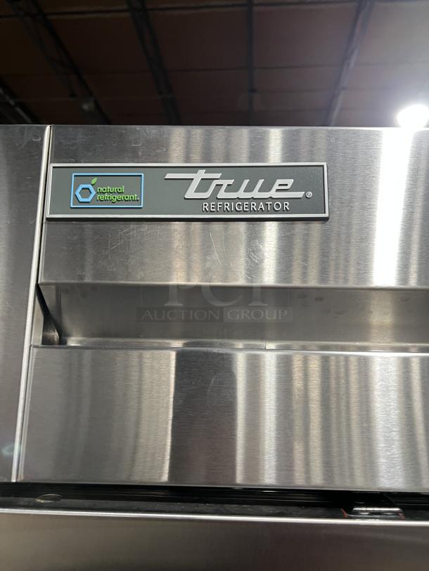 True T49HC Stainless Steel 2-Door Refrigerator, poly-coated racks, on casters, natural refrigerant label, serial 9116892.