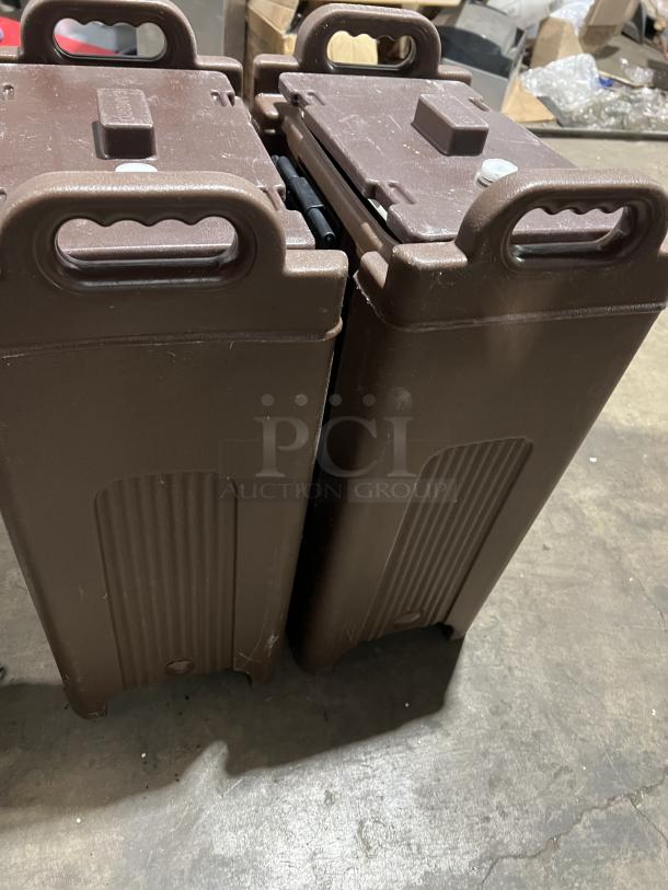Pair of Cambro Carlisle Series brown insulated beverage dispensers with handles. Sturdy, commercial-grade condition.