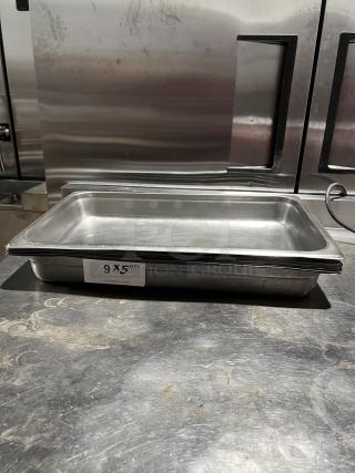 Commercial stainless steel stackable steam table pan, quantity 9, shown on a stainless surface, ideal for catering or kitchen use.