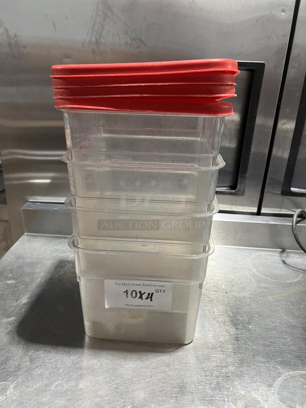 Stack of four commercial clear polycarbonate 6 qt. food storage containers with red lids. Label reads "10X QTY."