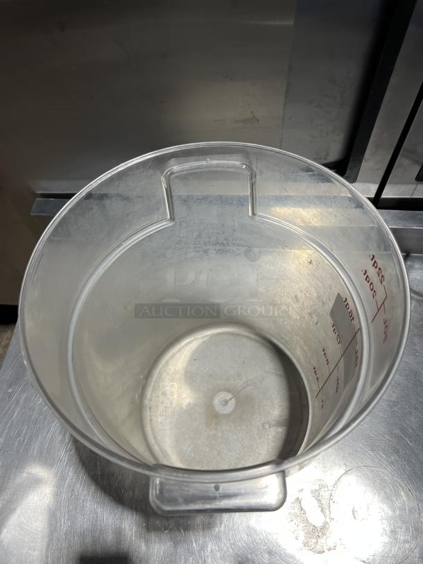 Cambro clear polycarbonate 22 qt. round food storage container, visible measurement markings, excellent condition.