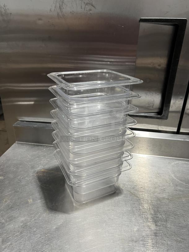 Cambro clear polycarbonate food storage pans, stack of eight. Excellent condition, durable for commercial use.