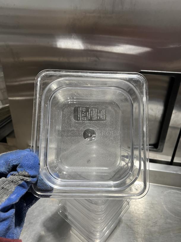 Cambro clear polycarbonate food storage pan, stackable, durable, with visible capacity markings. Excellent condition.