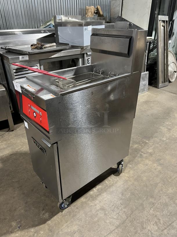Vulcan PowerFry3 stainless steel gas fryer with basket, hanger, and backsplash. Model 1TR45D-1 on casters.